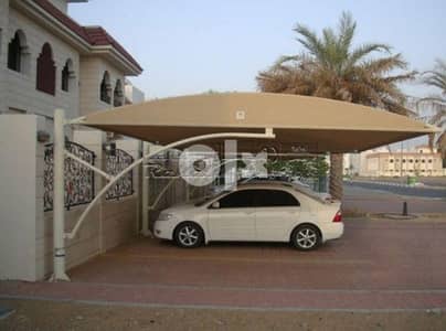 repair all parking shade نقوم بإصلاح جميع أنواع مظلات وقوف السيارات