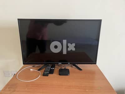 32 inch Tv + MI box,well working condition