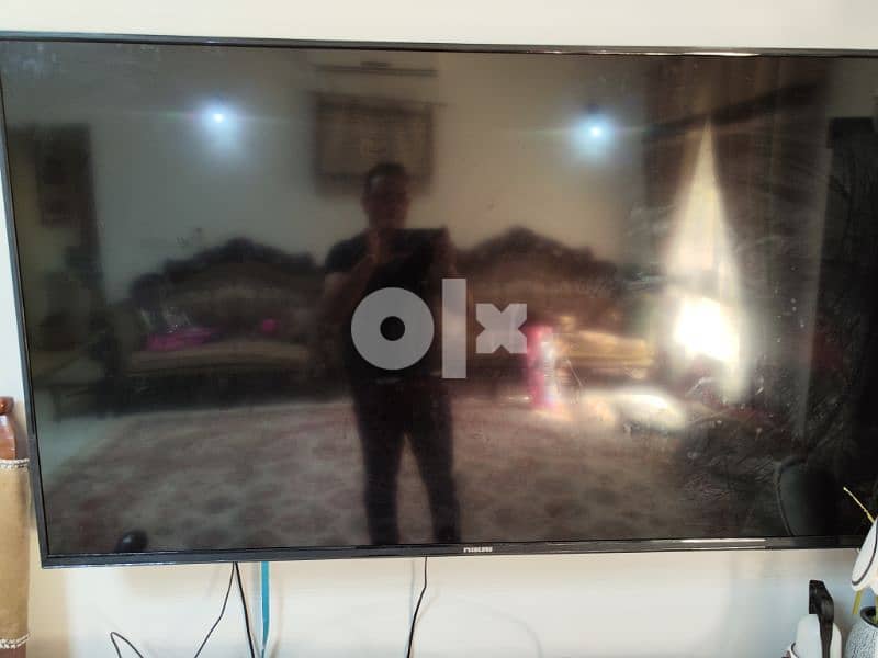 NIKAI 65 INCH SMART TV WITH STAND 2
