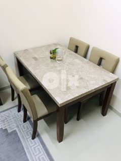 Dining table ( Marble topped )