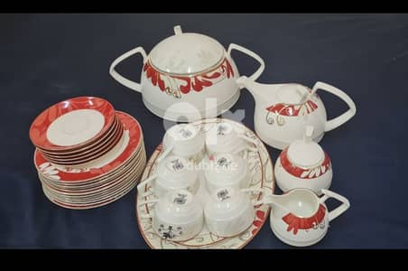 complete tea set  with serving plates and plates stand