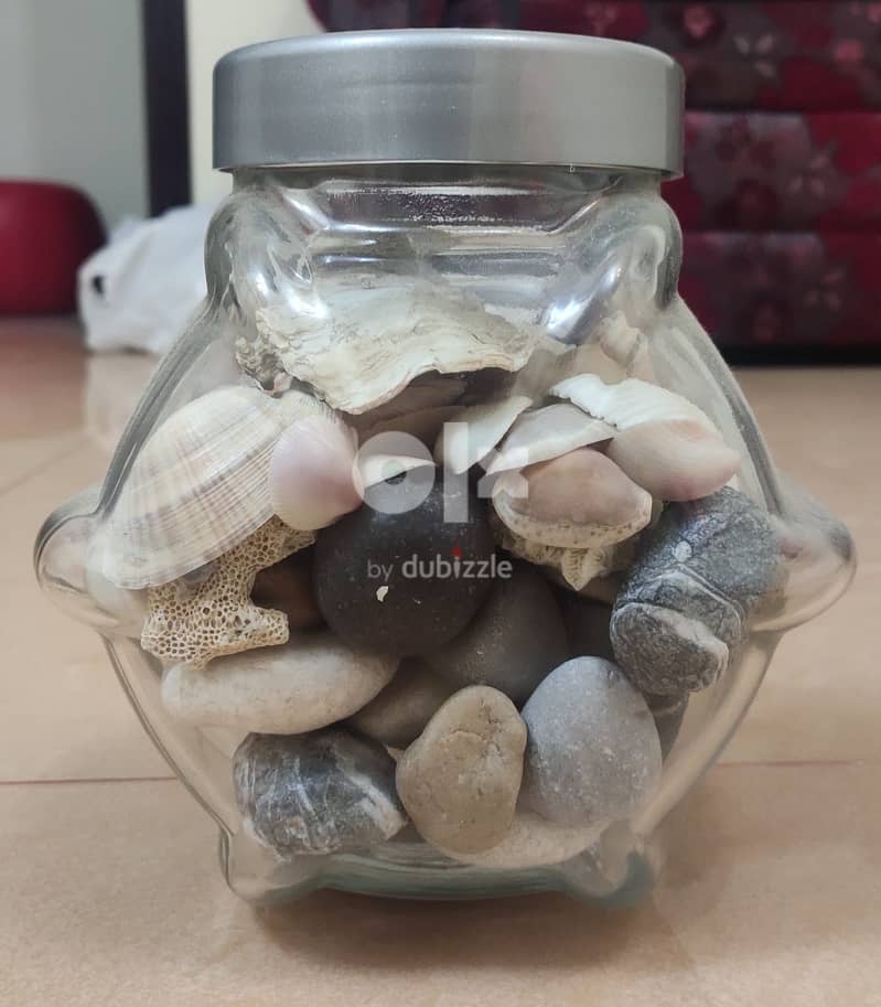 GLASS JAR WITH PEBBLES AND SHELLS 1