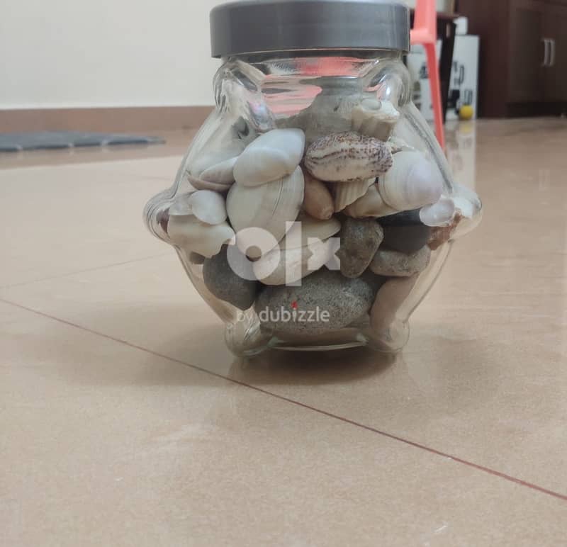 GLASS JAR WITH PEBBLES AND SHELLS 3