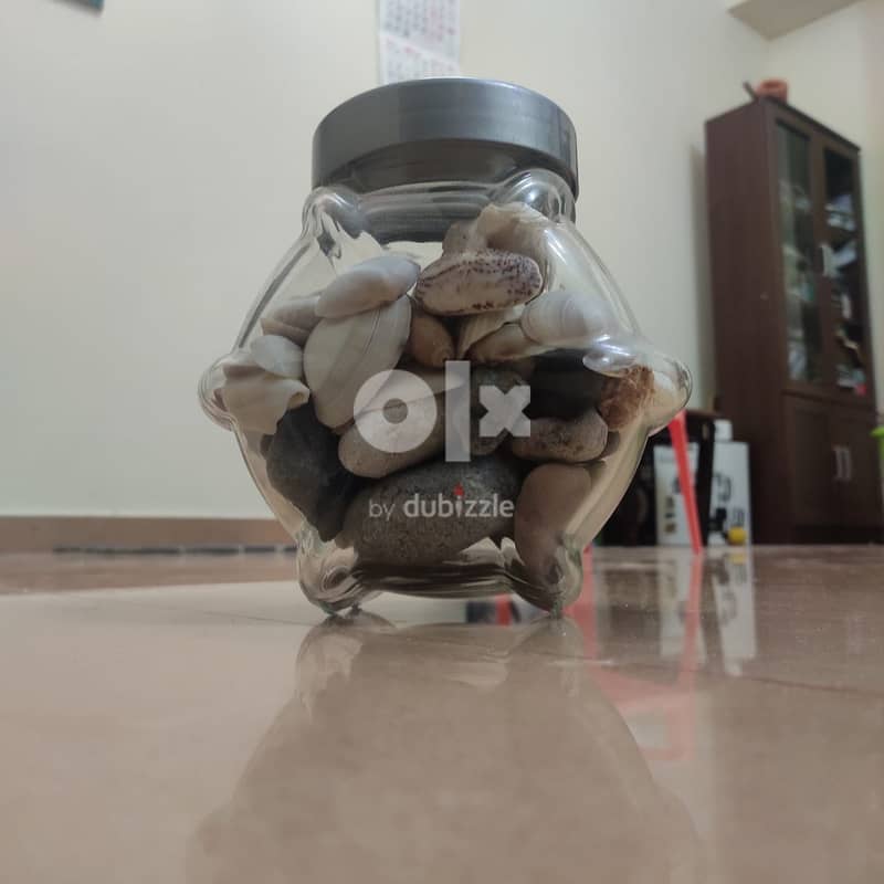 GLASS JAR WITH PEBBLES AND SHELLS 4