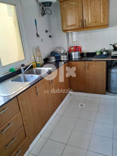 single room sharing kitchen and washroom 2