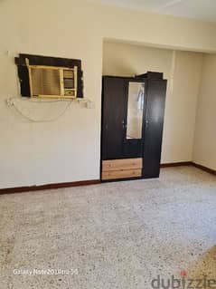 Big room with attached bathroom and window A C near kuwaiti mosque WK