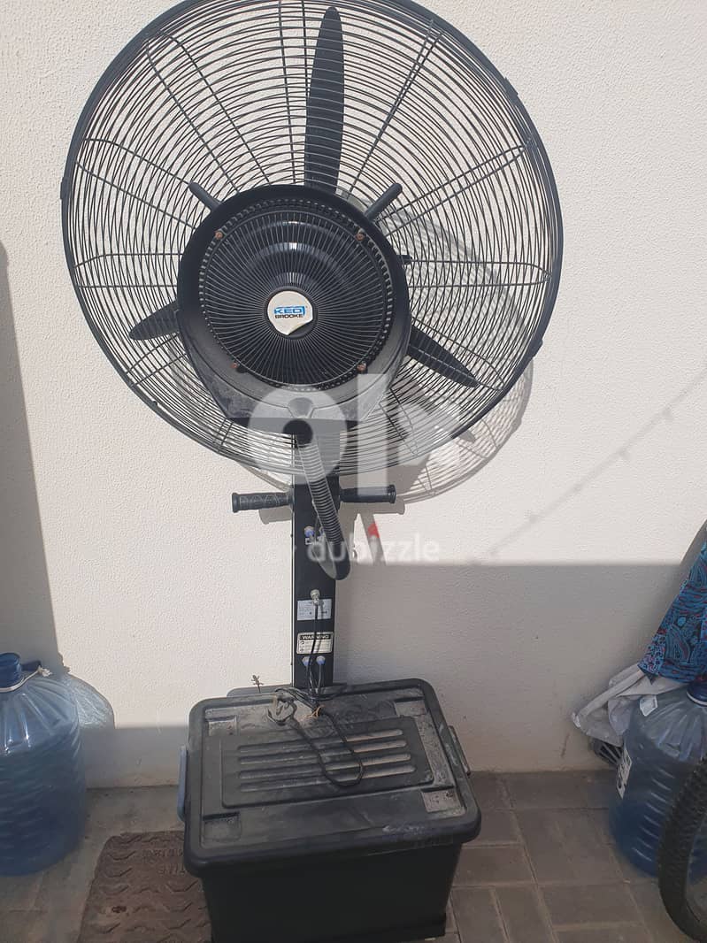 In great condition,  Rarely used out door fan with mist 0