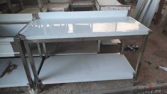 stainlesss steel working table. . Delivery available