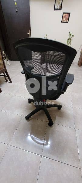 Revolving chair for sale 0