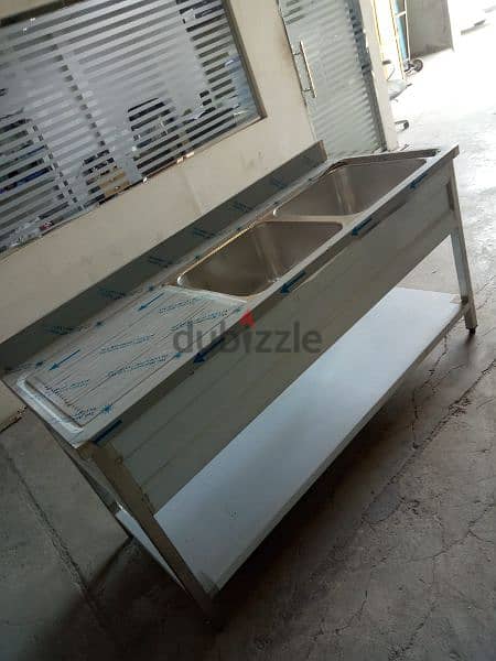 fabriating steel work table sink and shelf 1