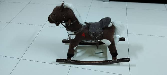 wooden made horse,very cute and singing music sound