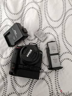 Nikon D5300 with Battery Pack + 3 Batteries + Memory Card 0