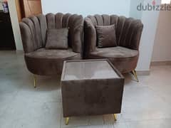 2 single seater sofas with coffee table