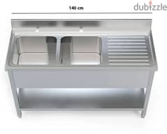 customising stainless steel sink double with table