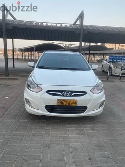 2013 Hyundai Accent Hatchback  'mailage 199 k ' Excellent condition