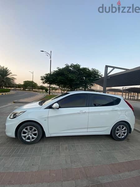 2013 Hyundai Accent Hatchback  'mailage 199 k ' Excellent condition 4