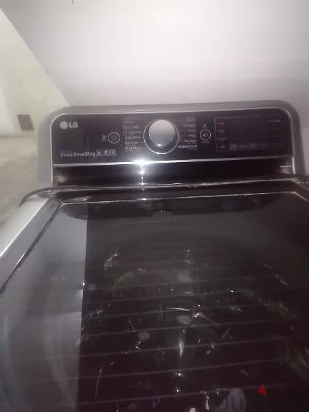 LG washing machine black color 24kg good working condition 1