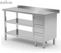 stainless steel table with middle shelf & drawes