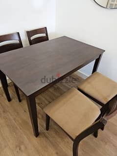 Dining Table with 4 chairs in new excellent condition only 9 month old 0