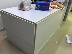cutting table and glass cabinet