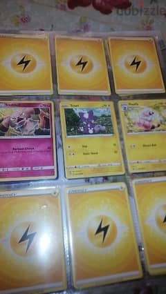 Pokémon and fifa cards with mewtwo covers and book