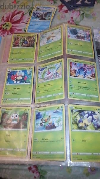 Pokémon and fifa cards with mewtwo covers and book 4