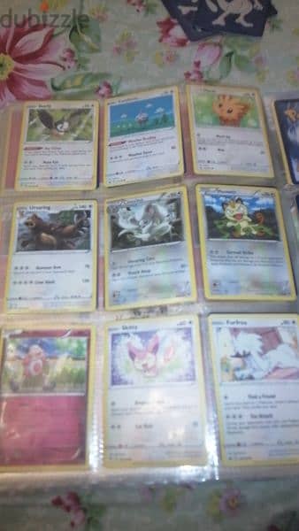 Pokémon and fifa cards with mewtwo covers and book 5