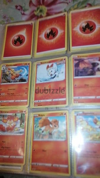 Pokémon and fifa cards with mewtwo covers and book 6