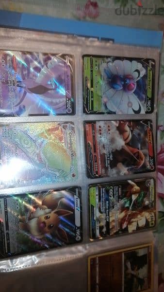 Pokémon and fifa cards with mewtwo covers and book 13