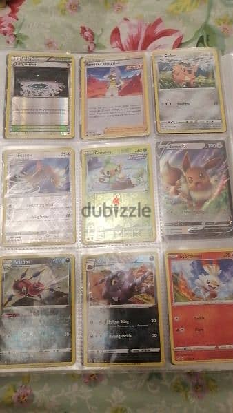 Pokémon and fifa cards with mewtwo covers and book 14