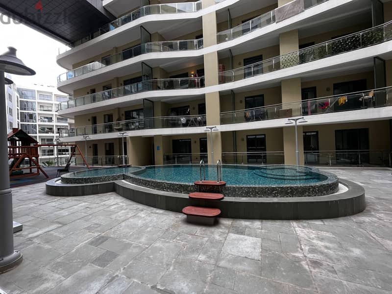 1 BR Flat in Muscat Hills with Shared Pool and Gym 1