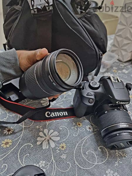Canon EOS 4000D for sale with charger and gaden side bag. 2