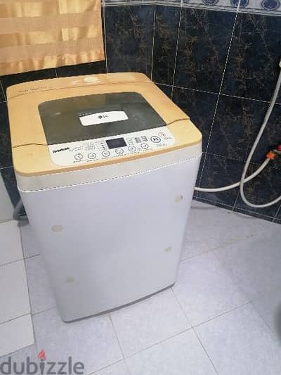 LG top load 7kg washing machine, working fine