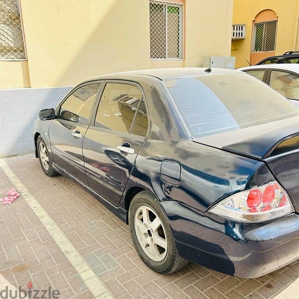 MITSUBISHI LANCER MODEL 2006  ONLY SERIOUS BUYERS CALL 2