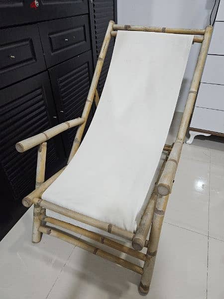 Foldable Wooden carpet chair. 0