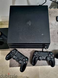Sony PS4 Pro 1 TB with 2 controllers & 3 games 0