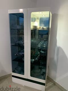Beautiful Glass showcase with light  new condition