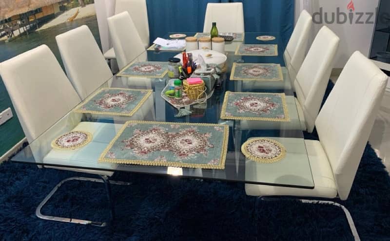 8 seater glass dining table in good condition 1