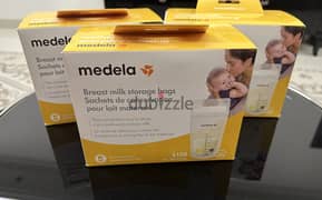 New sealed box containing 100 Medela milk storage bags