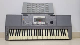 Electric keyboard including stand