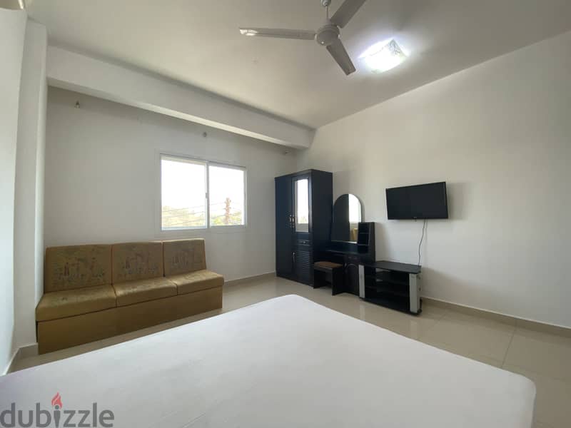 Furnished spacious room with attached bath in Ghubra + all amenities 3