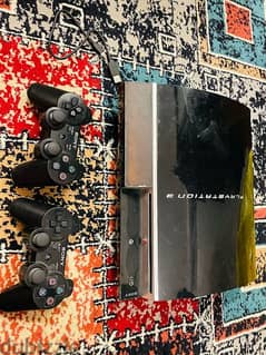 Playstation 3 with 2 controllers and 20 games GTA v Minecraft's