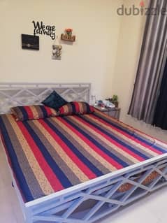 King size bed and one single bed under with mattress