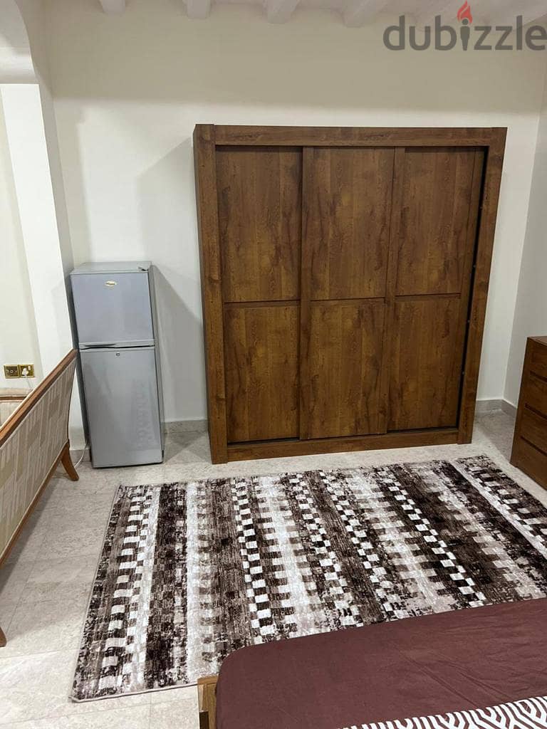 furnished studio for rent in Al Khuwair 33 Area near the College of 3