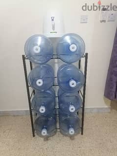 water dispenser + 8 bottles + stand