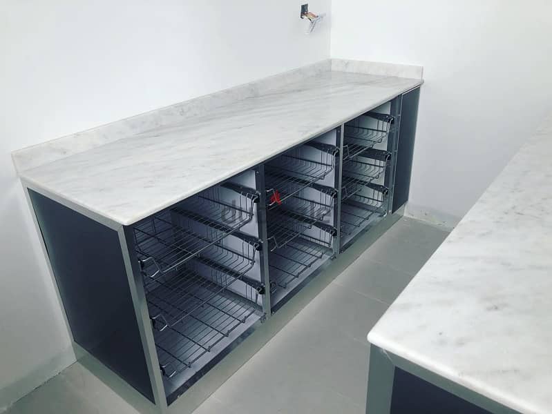 kitchen cabinets with aluminium, glass and glidding sheet 17