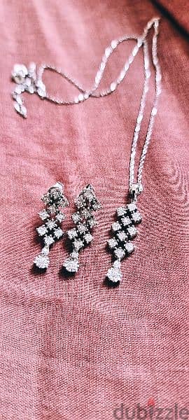 White gold necklace and earrings with diamands incl. certificates 0