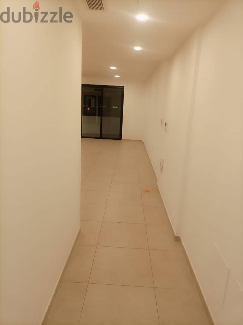 Live in a spacious and modern apartment in Golf tower Muscat Hills 11