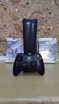 Xbox 360 Slim with one controller and games