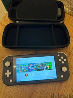 Nintendo Switch Lite - 14 Games included (unlimited games can be added